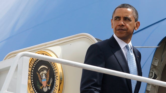obama boards AF1 051011